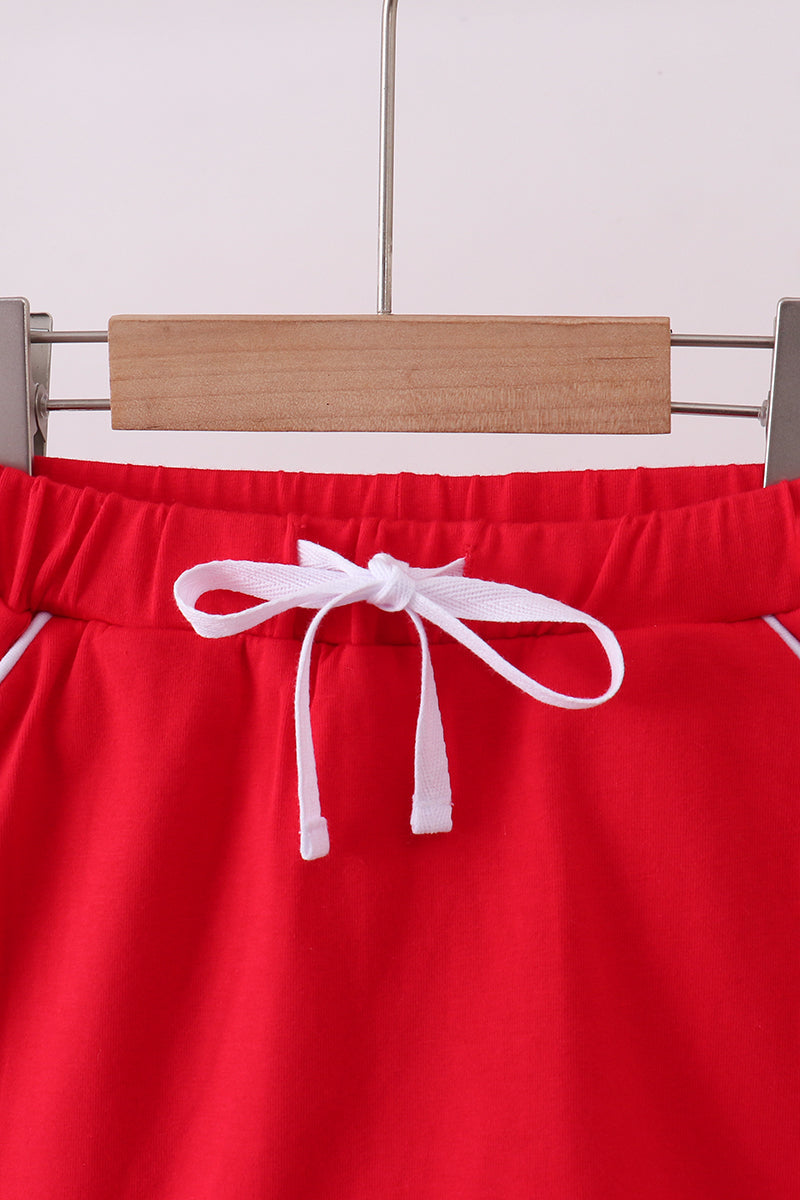 Red scallop hem bow skort