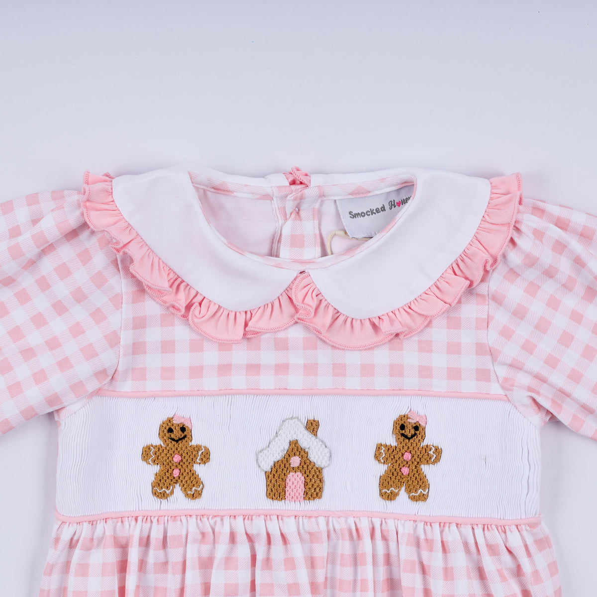 Pink gingerbread hand smocked gingham ruffle bubble