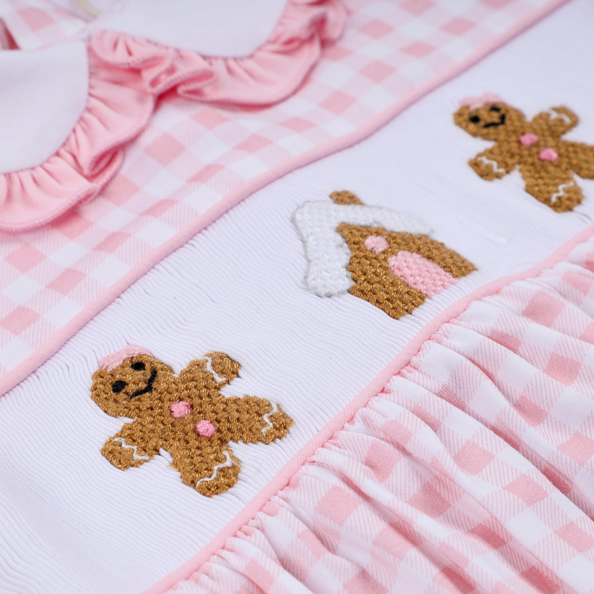 Pink gingerbread hand smocked gingham ruffle bubble