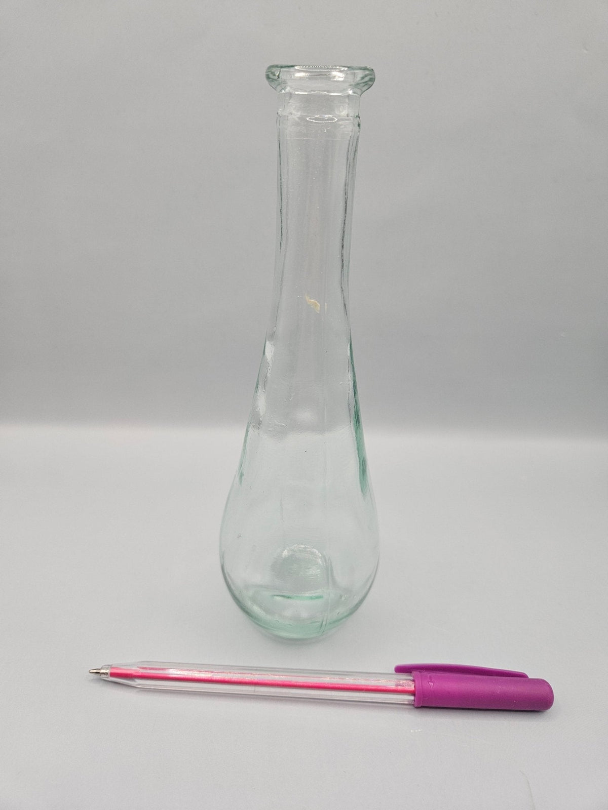 Vintage Glass Bottle – 7" x 2", Elegant Teardrop Shape
